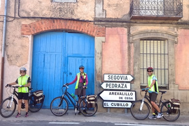 three cyclists in Segovia